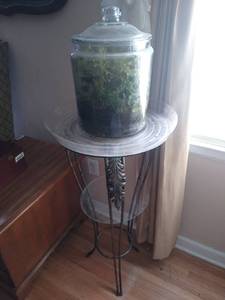 lot 1935 image: Metal plant stand 34 12 Tall  with terrarium plant 13 12