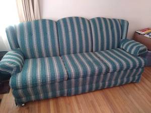 lot 1947 image: Legacy Mastercraft 3 person couch with castor wheels color - green with pattern 33 X 81