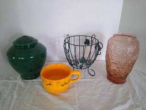 lot 1956 image: Metal plant stand, planter and other home decor