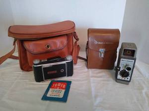 lot 1979 image: Bell&Howell 319 8mm movie camera wsunometer and a Tower Vintage folding camera Crystar Lens with bag