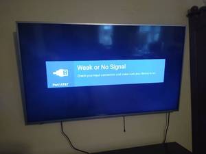 lot 1987 image: 58 Sharp TV w attached wall mount & remote like new