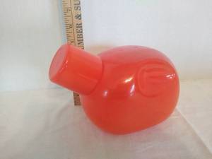 lot 2012 image: Bedside carafe modeled after a motorcycle gas tank