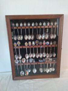 lot 2064 image: Collector spoons in display case
