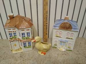 lot 2138 image: (2) Avon town house canisters & duck figurine