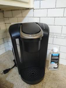 lot 2166 image: Keurig coffee maker wcoffee maker cleaner Like New