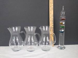 lot 1958 image: 3 small glass pitchers w Galileo thermometer
