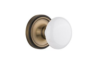 lot 25499 image: Nostalgic Warehouse Classic Rosette with White Porcelain Door Knob, Privacy - 2.375, Antique Brass