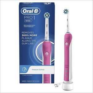 lot 25743 image: Oral-B Pro 1000 CrossAction Electric Toothbrush, Pink, Powered by Braun