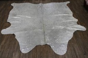lot 22425 image: SILVER METALLIC ON WHITE LARGE Real Natural Cowhide Rug Area Rugs- Retail$317.49