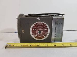 lot 2011 image: Antique Bell and Howell 16mm Magazine Camera.