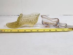 lot 2031 image: Two Cute Glass Slippers. One is Souvenir of Starkweather, North Dakota.