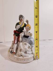 lot 2036 image: Handpainted Figurine Made in Occupied Japan. Man and Woman and Musical Instrument.