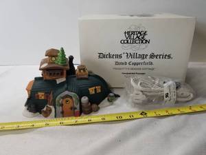 lot 2053 image: Heritage Village Collection. Dickens Village Series. David Copperfield. Peggottys Seaside Cottage. Department 56