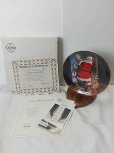 lot 3032 image: Edwin M Knowles China Company 1992 The Sundblom Santa Series Santas On His Way Inspried Art by Haddon Sundblom Porcelain Decorative Plate with Box and Certificate of Authenticity