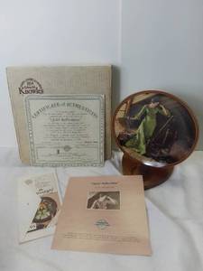 lot 3034 image: Edwin M Knowles China Company Quiet Reflections by Normal Rockwell Porcelain Decorative Plate with Box and Certificate of Authenticity