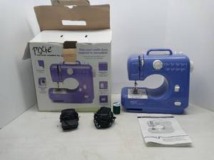 lot 3715 image: Purple Singer Pixie Craft Sewing Machine Tested And Working