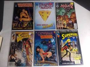 lot 1062 image: Lot of 6 Comics Spider-Woman Supergirl Vampirella