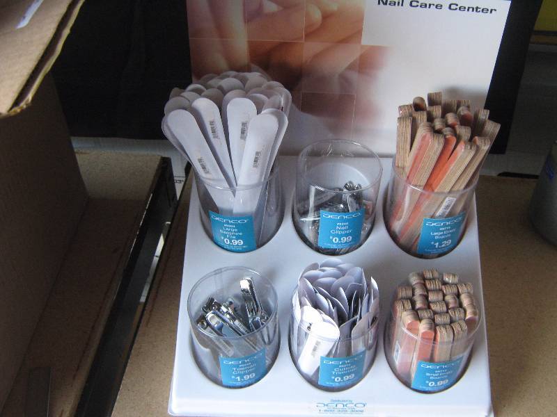 lot 3076 image: Denco Nail Care Center, display with clippers, files, emery boards, etc.