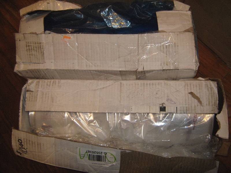 lot 3144 image: 2 ct. lot Garland Laundry Supplies 72 Poly dress bags, open boxes count unknown, one blue, one clear
