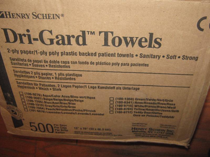 lot 3155 image: Dri-Guard Towels Henry Schein 2 ply paper, 1 ply poly, open box