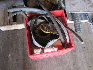 lot 4121 image: Various Truck Parts Rubber Hosing Trim Gates Radiator Hose Stock