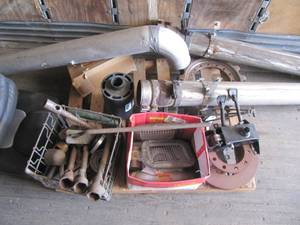 lot 4120 image: Various Truck Parts featuring exhaust pipes- Hydraulic controls- Exhaust pipes