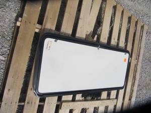 lot 4117 image: Side panel window for an RV