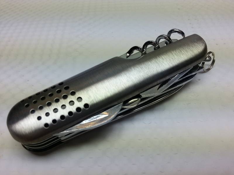 lot 1482 image: A guy could hurt his self just trying to get all these options opened on this imported pocket knife.