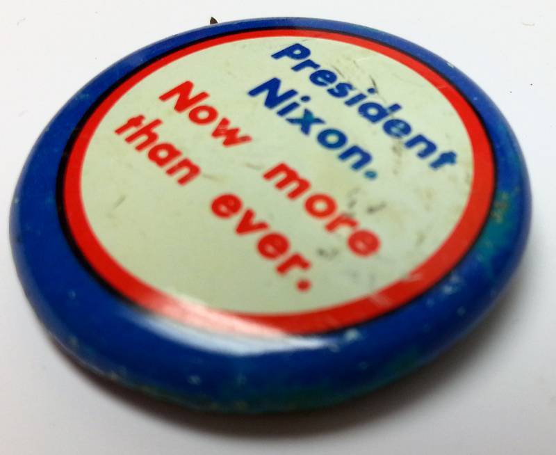 lot 1480 image: 1972 President Nixon Now more than ever metal Red, White & Blue hat lapel pin.