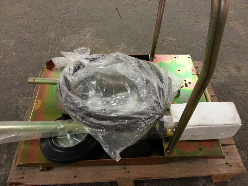 lot 1496 image: A small pallet full of portable lubrication 51 (55 gallon drum size) cart components left from a warehouse closing.