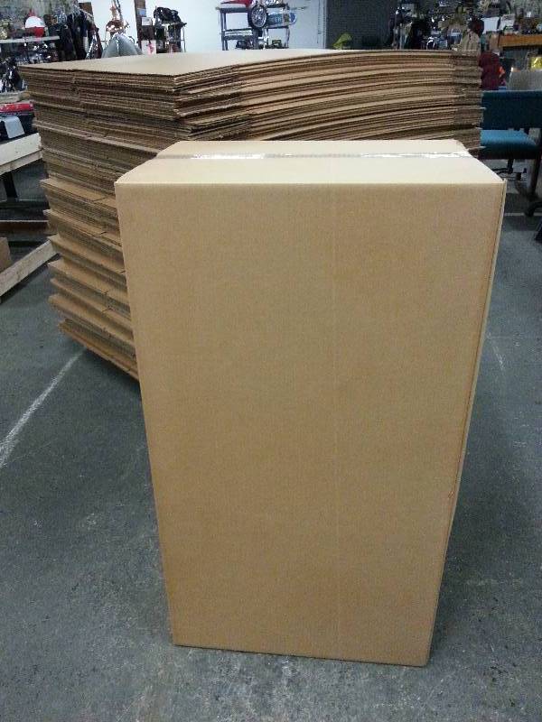 lot 9037 image: Stack of 10 each of this 41 tall X 22 X 17 HD Gross Weight Limit of 65 lbs. cardboard boxes.