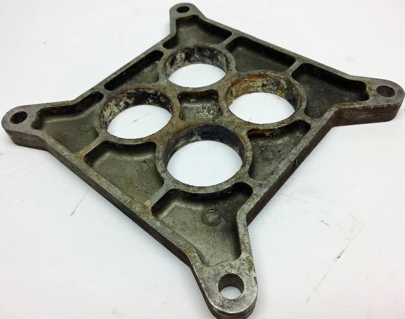 lot 1504 image: Looks pretty humble but will clean up and be functional is this 12 Holley Edelbrock and any square bore 4 barrel carburetor spacer or heat dissipation plate