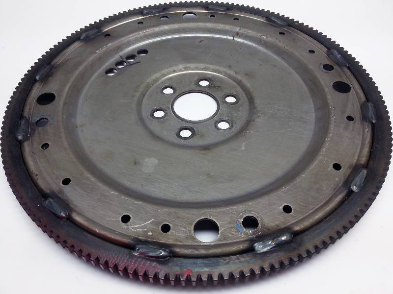 lot 1505 image: Very little use and low hours on this Ford 240 300 cubic inch inline 6 cylinder automatic transmission flywheel flex plate.