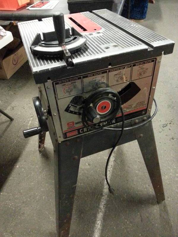 lot 1519 image: 9 Sears Craftsman table saw that works excellent and was replaced with a larger one.  The Rip fence is not included, but the Table Saw Miter pusher assembly is