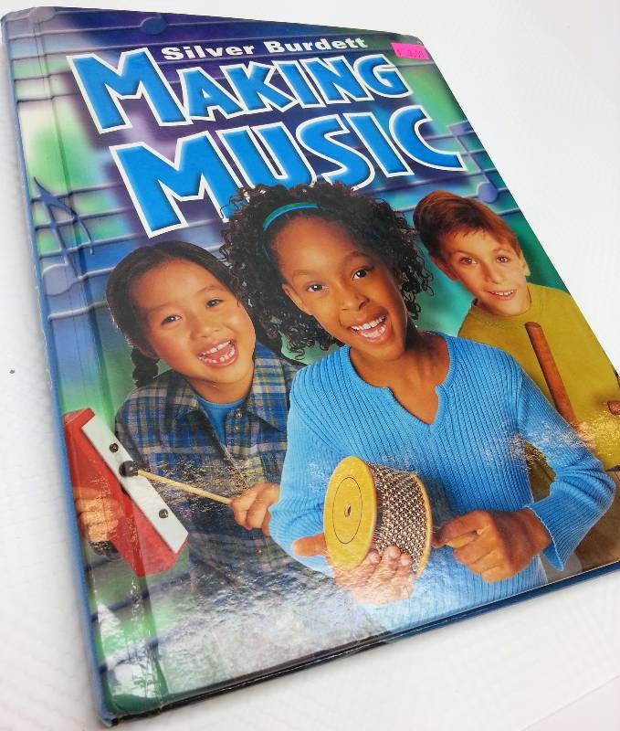 lot 9040 image: Over 400 pages of Making Music information and fun things to do and sing in this Blue Cover book.