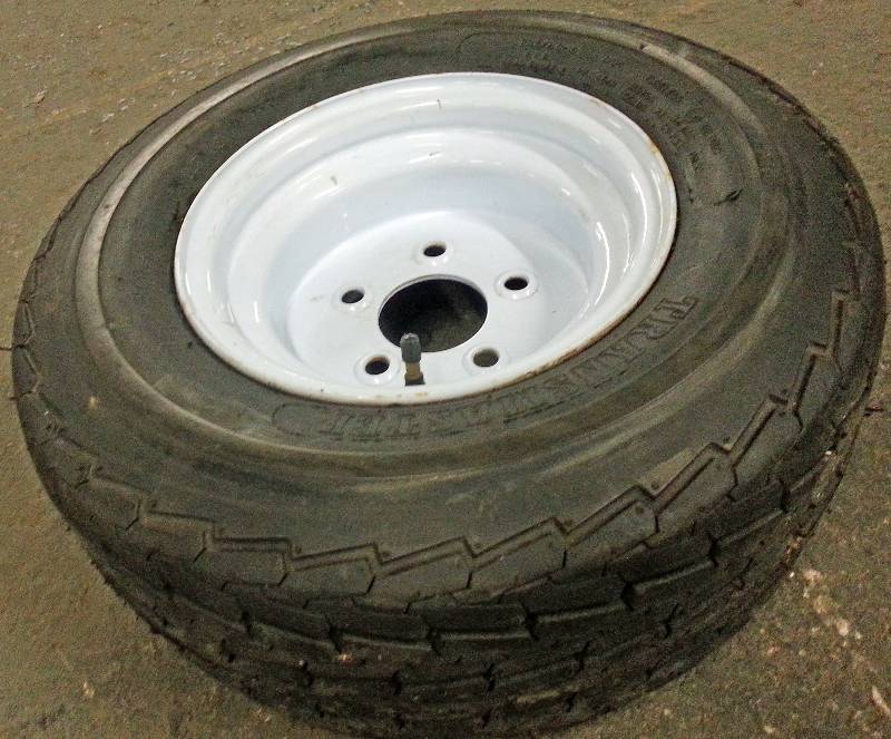lot 1524 image: New single 20.5X8.0-10 boat utility or lawn mower trailer tire and wheel