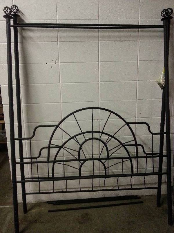 lot 1535 image: Cow Boy metal bed head and foot frames.  82 tall overall and 60 wide.  Not sure what size bed its actually made for.