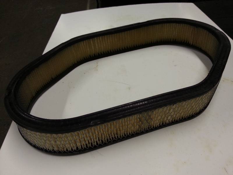 lot 1533 image: New old stock AC Spark Plugs air cleaner element for the Corvette, Camaros and Firebird V8s with the CrossFire fuel injection.