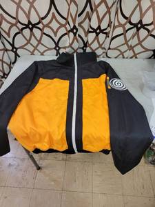 lot 23942 image: Orange Black 2pc Track Suit size XL