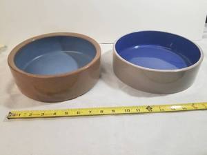 lot 1244 image: Two Stoneware Crock Pet Dishes.