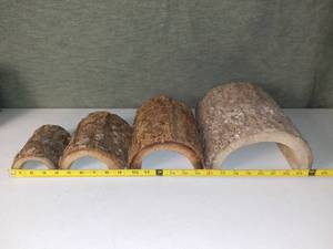 lot 5177 image: 4 Different Size Habba Hut Wood Pet Shelters