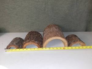 lot 5178 image: 4 Different Size Habba Hut Wood Pet Shelters