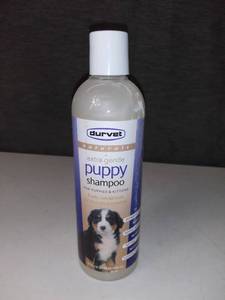 lot 5210 image: Durvet Extra Gentle Puppy Shampoo For Puppies and Kittens. 17 oz