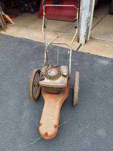 lot 6022 image: Walk Behind String trimmer