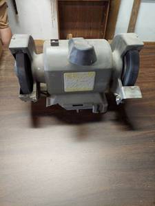lot 6045 image: Bench Grinder - base is broken