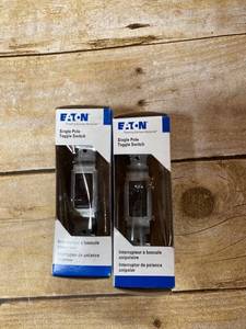 lot 5645 image: Eaton 15-amp Black Toggle Light Switch