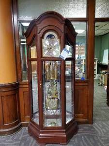 lot 100 image: Howard Miller CHM1066 Sensational Triple Chiming Curio Grandfather Clock (Made in USA) - Majestic II Deluxe - Retail $5,099.99