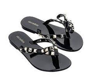 lot 56499 image: Womens Mini Melissa Slip-On Bow Sandals (Harmonic Studs, Size 1)