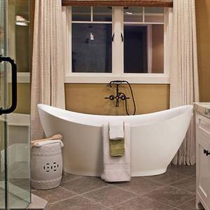 lot 16598 image: Freestanding acrylic bathtub with polished chrome round overflow and pop-up drain. 6513