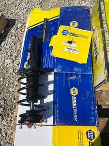 lot 1603 image: Lot of 2 Struts ( 1) NAPA NEW Loaded STRUT Napa Part # LS57495   (1) Unity Strut ASSEMBLY -New Removed from Parts Room